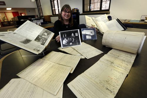 Kathleen Epp, Senior Archivist at the Archives of Manitoba with some of the items that will be on display at the Open House to commemorate the 100th anniversary of the Women's Suffrage in Manitoba. Original records from the archives and publications from the Legislative Library including the rolled up original Women's Christian Temperance Union petition from 1893 with 5000 signatures at right and the 1910 petition from the Gimli Suffrage Association containing 11,000 signatures in the foreground at left will be on display Saturday, Jan. 9 in the Archives Research Room at 200 Vaughan St. from noon to 4 p.m.  see release  Wayne Glowacki / Winnipeg Free Press Jan. 6 2016
