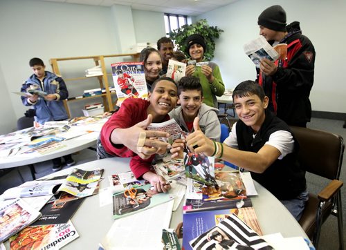 Syrian youths who arrived with their families within the last few days to Winnipeg cut photos out of magazines that represent their future dreams at a class at NEEDS,  a  pre-education program to help students get acclimatized and prepared to enter the public school  system when they get into their permanent housing.  See Carol Sanders story.     Jan 06, 2016 Ruth Bonneville / Winnipeg Free Press