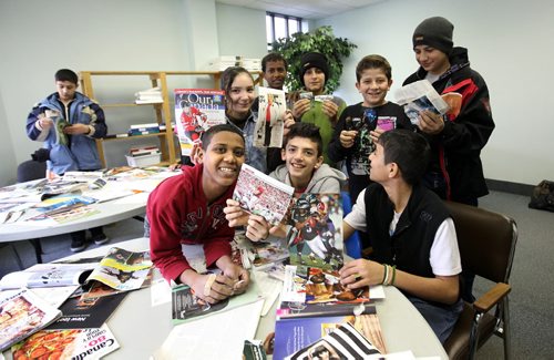 Syrian youths who arrived with their families within the last few days to Winnipeg cut photos out of magazines that represent their future dreams at a class at NEEDS,  a  pre-education program to help students get acclimatized and prepared to enter the public school  system when they get into their permanent housing.  See Carol Sanders story.     Jan 06, 2016 Ruth Bonneville / Winnipeg Free Press