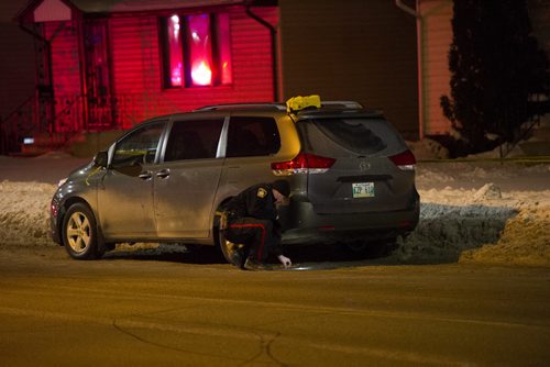 DAVID LIPNOWSKI / WINNIPEG FREE PRESS 160106  Winnipeg Police were on scene investigating an incident involving a motorized wheelchair and a Toyota minivan Wednesday January 6, 2015 on Mountain Avenue.