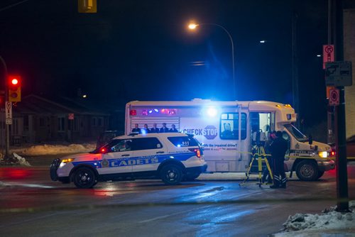 DAVID LIPNOWSKI / WINNIPEG FREE PRESS 160106  Winnipeg Police were on scene investigating an incident involving a motorized wheelchair and a Toyota minivan Wednesday January 6, 2015 on Mountain Avenue.