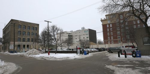 Local developer Albert Cheung will be building a new apartment complex on a surface parking lot at the foot of Market Avenue. This view is at the foot of Market Ave. at left Bertha St. begins.  Murray McNeill story Wayne Glowacki / Winnipeg Free Press Jan. 7 2016