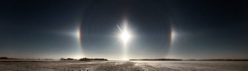 Ice crystals in the atmosphere create an "sun dog" over blowing snow across the open prairie Friday Morning South of Winnipeg. January 8, 2016 - (Phil Hossack / Winnipeg Free Press)