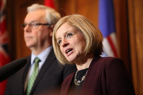 Alberta Premier Rachel Notley answers questions from the media after signing documents with Manitoba Premier, Greg Selinger, on energy infrastructure, renewable energy and climate-change priorities at the Legislative Building Friday.   Jan 08, 2016 Ruth Bonneville / Winnipeg Free Press
