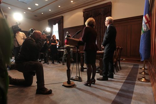 Alberta Premier Rachel Notley answers questions from the media after signing documents with Manitoba Premier, Greg Selinger, on energy infrastructure, renewable energy and climate-change priorities at the Legislative Building Friday.   Jan 08, 2016 Ruth Bonneville / Winnipeg Free Press