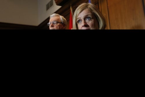 Manitoba Premier Greg Selinger and Alberta Premier Rachel Notley speak to media today, Friday, January 8, 2016, at the Manitoba Legislature in Winnipeg, after meeting to discuss a number of issues of importance to both Alberta and Manitoba, and the premiers also signed a memorandum of understanding on shared energy and climate change priorities.   THE CANADIAN PRESS/John Woods
