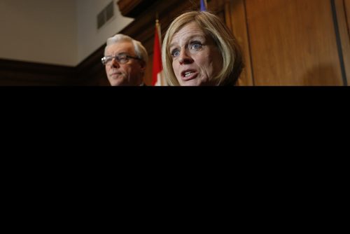 Manitoba Premier Greg Selinger and Alberta Premier Rachel Notley speak to media today, Friday, January 8, 2016, at the Manitoba Legislature in Winnipeg, after meeting to discuss a number of issues of importance to both Alberta and Manitoba, and the premiers also signed a memorandum of understanding on shared energy and climate change priorities.   THE CANADIAN PRESS/John Woods