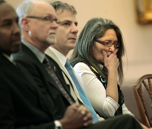 Debi Spence, who has dedicated her life to helping those less fortunate, notably homeless Winnipeggers gathers her emotions as her list of accomplishments are read for her induction into the Order of the Buffalo Hunt. . See release. January 8, 2016 - (Phil Hossack / Winnipeg Free Press)