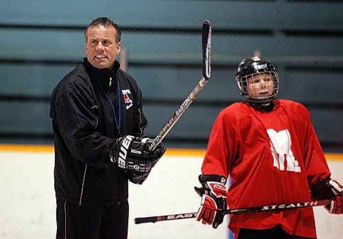 BORIS MINKEVICH / WINNIPEG FREE PRESS  080204 Winnipeg Monarchs coach Carey Chartier during practice at Keith Bodley Arena.