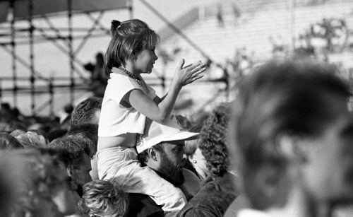 David Bowie concert August 19, 1987. A young girl gets a better view during the David Bowie Glass Spider concert at the Winnipeg Stadium. Todd Korol / Winnipeg Free Press