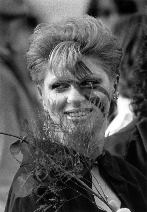 A fan with her face painted holds a rose during the David Bowie concert on September 14, 1983. Glenn Olsen / Winnipeg Free Press