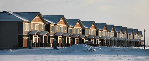 Condos roll off the assembly line in Bridgewater's development, for a story on the housing start totals for December and 2015. They were up slightly, with all of the growth on the multi-family side. See Murray McNeil's story. January 11, 2016 - (Phil Hossack / Winnipeg Free Press)
