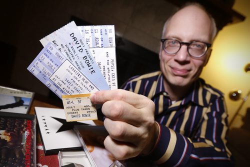 January 11, 2016 - 160111  -  Kenton Larsen is photographed Monday, January 11, 2016 in his home with his tickets for the four David Bowie Winnipeg concerts he attended.  John Woods / Winnipeg Free Press