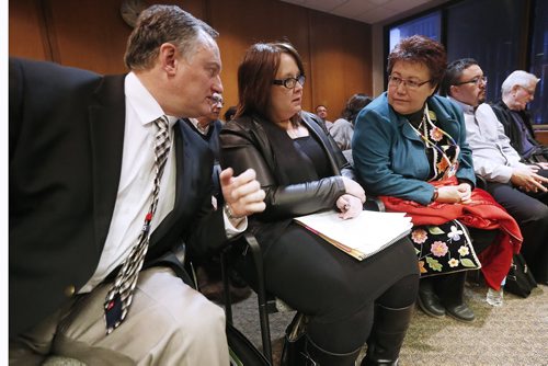 January 12, 2016 - 160112  -  Assiniboia Downs CEO Darren Dunn (L) and Michelle Richard (C) speak with Chief Cindy Spence of Peguis First Nation at a hearing  of the Assiniboia Community Committee for an urban reserve at the downs at City Hall Tuesday, January 12, 2016. John Woods / Winnipeg Free Press