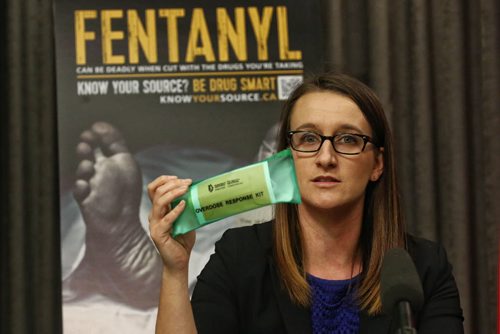 The NDP government announced the creation of a new task force to address a growing illegal use of fentanyl, a powerful synthetic opioid drug. Dr. Joss Reimer, medical officer of health, WRHA, holds up a naloxone kit which will be made available to high-risk opioid users for emergency.  160113 Wednesday 13, 2016 Mike Deal / Winnipeg Free Press