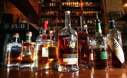 Some of the premium Canadian whiskeys in the Whiskey Bar at the Toad in the Hole Pub on Osborne St. Al Small story Wayne Glowacki / Winnipeg Free Press Jan. 13 2016