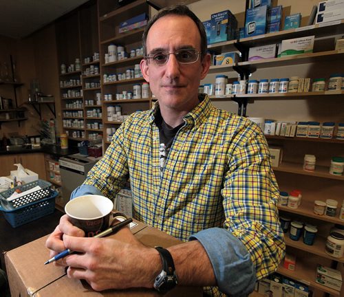 Pharmasist Jordan Charles poses in his Main Street dispensary.  See Kristin Annable story re: presecription Drugs such as Tylenol 1.......January 13, 2016 - (Phil Hossack / Winnipeg Free Press)