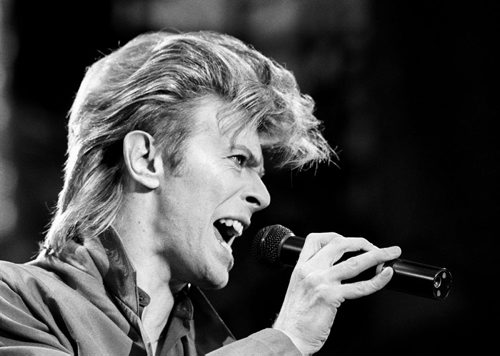 David Bowie performs in a June 19, 1987, file photo. Bowie's death from cancer came as a shock, even to many of those who had known him for years because he kept his diagnosis secret. Experts say there are a number of reasons why some people decide to hide their illness and why others feel the need to chronicle their cancer journey publicly. THE CANADIAN PRESS/PA, File via AP UNITED KINGDOM OUT NO SALES NO ARCHIVE