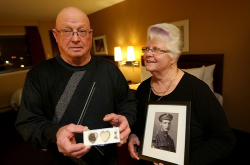 Jim and Patricia Halliday, from near Boissevain, with a locket that belonged to Private Sidney Halliday, who was killed in the First World War and will have a lake named in his honour, Wednesday, January 13, 2016. (TREVOR HAGAN/WINNIPEG FREE PRESS)