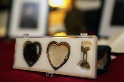 Jim and Patricia Halliday, from near Boissevain, with a locket, ring, bible, and letter, that belonged to Private Sidney Halliday, who was killed in the First World War and will have a lake named in his honour, Wednesday, January 13, 2016. (TREVOR HAGAN/WINNIPEG FREE PRESS)