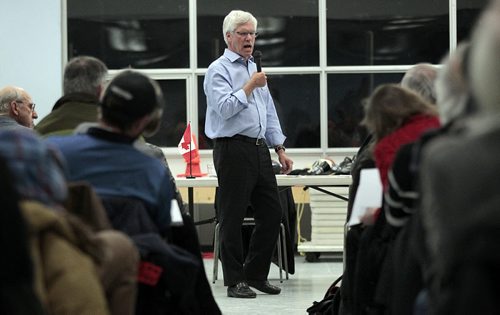 Newly elected Liberal MP and Minister of Natural Resources Jim Carr holds court at the Riverview Community Club Wednesday evening. See Ashley Prest story. January 13, 2016 - (Phil Hossack / Winnipeg Free Press)