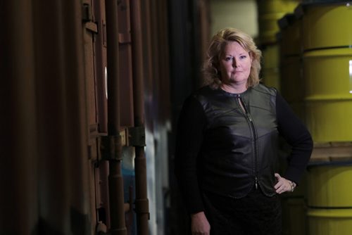 Diane Gray, president and CEO, CentrePort Canada Inc. poses next to rail cars inside Bison Warehouse after announcement that a new Rail Park will break ground at Manitoba's inland port with Thursday. See Martin Cash story.   Jan 14, 2016 Ruth Bonneville / Winnipeg Free Press