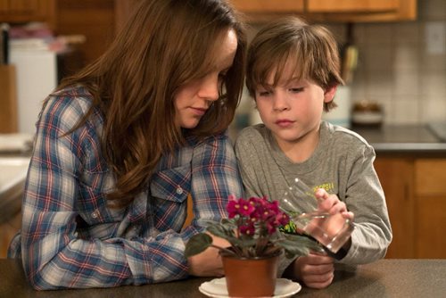 In this image released by A24 Films,  Brie Larson, left, and Jacob Tremblay appear in a scene from the film, "Room." Larson was nominated for an Oscar for best actress on Thursday, Jan. 14, 2016, for her role in the film. The 88th annual Academy Awards will take place on Sunday, Feb. 28,, at the Dolby Theatre in Los Angeles.  (A24 Films via AP)
