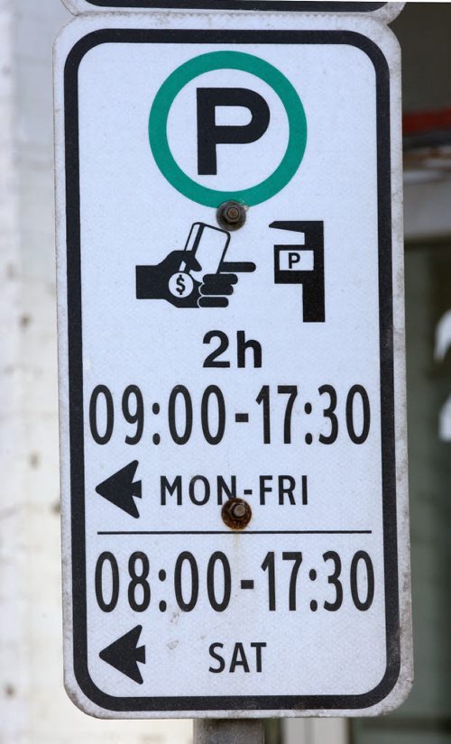 Parking sign on Princess St which denotes the rules for parking/paying for on-street meters- See Kristin Annable story- Jan 14, 2016   (JOE BRYKSA / WINNIPEG FREE PRESS)