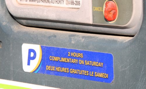 Sticker the Parking Authority puts on meters which denotes complimentary parking on Saturdays on Princess St - See Kristin Annable story- Jan 14, 2016   (JOE BRYKSA / WINNIPEG FREE PRESS)
