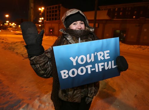 Harley Bray of Youth United thanks donors at the United Way Winnipeg Drive-Thru Boot Drive on Jan. 13, 2016 at United Way headquarters on Main Street. Donors who dropped off lightly-used children's boots were treated to free coffee and Jonnies Sticky Buns. The GenNext program, Koats For Kids and Grace Café were also involved in the event. Photo by Jason Halstead/Winnipeg Free Press RE: Social Page
