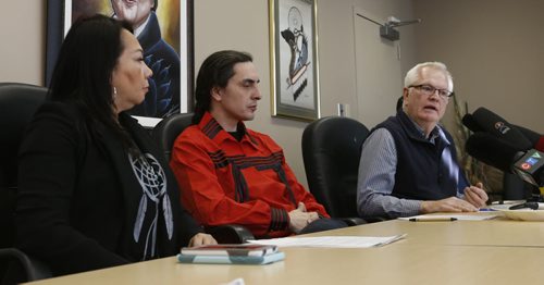 In centre, Chief Arlen Dumas, Mathias Colomb Cree Nation, MKO Grand Chief Sheila North Wilson and Merv Tweed, president of Omnitrax Canada at a news conference Friday to update details on the First Nations agreement in relation to the purchase of the Hudson Bay Railway from Omnitrax.  The news conference was held in the MKO boardroom. Martin Cash story Wayne Glowacki / Winnipeg Free Press Jan. 15 2016