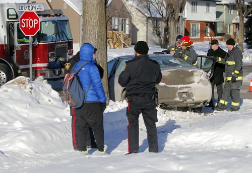 MVC Montrose and Corydon. 2 cars involved. No injuries. Car hit house. BORIS MINKEVICH / WINNIPEG FREE PRESS January 15, 2016