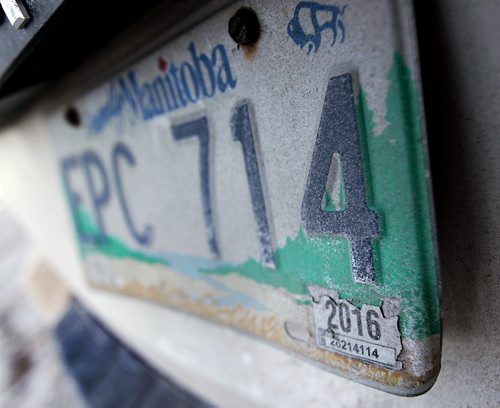 Licence plate stickers  those little stick-on squares in the corners  will no longer be required as of March 1. See Chad Scarsbrook story. January 15, 2015 - (Phil Hossack / Winnipeg Free Press)