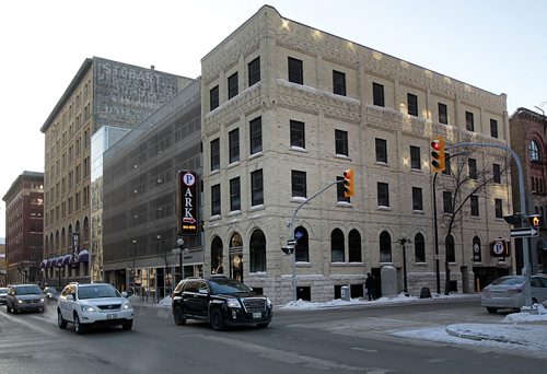100 King St. the Bedford Parkade & Retail complex at the corner of King and Bannatyne. The main floor commercial spaces are now fully leased after sitting empty for nearly four years. See Murray McNeil's story. January 15, 2016 - (Phil Hossack / Winnipeg Free Press)