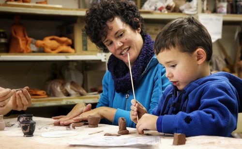 Sam Hechter, 5, and his mom, Penny, spent part of the afternoon taking in the new Winnipeg Art Gallery monthly family drop-in series called Family Fusion days. Today's workshop involved making mini-vases using self-hardening clay. The next Family Fusion event will be on February 14 and involve making valentines inspired by Aphrodite the goddess of love.  160117 January 17, 2016 MIKE DEAL / WINNIPEG FREE PRESS