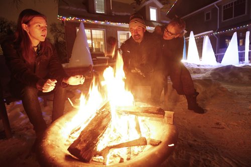 January 17, 2016 - 160117  -  David Falk (C) creates up to 21 frozen trees every year and enjoys them with his family and friends at his birthday outside his home Sunday, January 17, 2016.  John Woods / Winnipeg Free Press