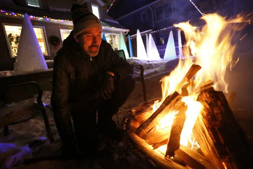 January 17, 2016 - 160117  -  David Falk creates up to 21 frozen trees every year and enjoys them with his family and friends at his birthday outside his home Sunday, January 17, 2016.  John Woods / Winnipeg Free Press