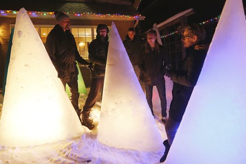 January 17, 2016 - 160117  -  David Falk (L) creates up to 21 frozen trees every year and enjoys them with his family and friends at his birthday outside his home Sunday, January 17, 2016.  John Woods / Winnipeg Free Press