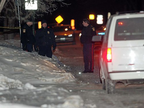 BORIS MINKEVICH / WINNIPEG FREE PRESS  080207 Police ident and other officers hold the scene in the 1000 block of Isbister in St. James.