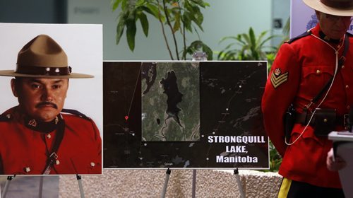 The province announcement Monday that a Manitoba lake will be named after RCMP Const. Dennis Strongquill (left), who was killed in the line of duty.   A ceremony was held Monday morning with members of the Strongquill family,Attorney General Gord Mackintosh and Assistant Commissioner Kevin Brosseau at the RCMP D Division HQ . Bill Redekop story. Wayne Glowacki / Winnipeg Free Press Jan. 18 2016