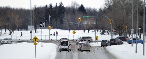 Traffic dead ends at where the Charleswood off leash dog park begins in the path of the William R. Clement Parkway in Charleswood Tuesday. See Ashley Prest story. January 19, 2016 - (Phil Hossack / Winnipeg Free Press)