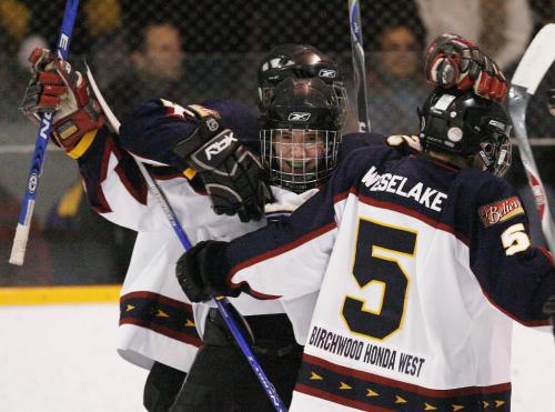 John Woods / Winnipeg Free Press / February 8, 2008- 080208  - Winnipeg Thrashers Micheal Hay (21) celebrates his goal with Jeff Weselake (5) and Matt Garvey (18), the Thrashers second goal against the Winnipeg Wild in St. Adolphe Friday, February 8, 2008.  Winnipeg Thrashers went into this game with a 36-0 record.