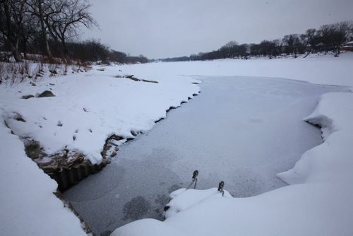 Culvert that opens into the Red River at St. John's Park on Main Street and Mountain Ave. View looking north east.    See story on raw sewage emptying into the river.   Aldo Santin.  Jan 20, 2016 Ruth Bonneville / Winnipeg Free Press
