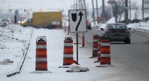 Barracades along Inkster between Burrows and Brookside have been reducing traffic to one lane for over a year and will be there for another year. Kristin Annable story.  January 20, 2016 - (Phil Hossack / Winnipeg Free Press)
