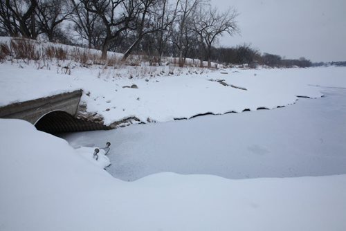Culvert that opens into the Red River at St. John's Park on Main Street and Mountain Ave. View looking north. See story on raw sewage emptying into the river.   Aldo Santin.  Jan 20, 2016 Ruth Bonneville / Winnipeg Free Press