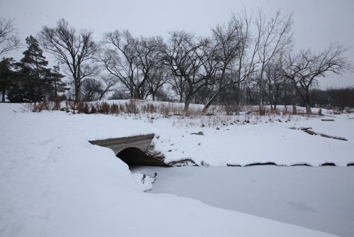 Culvert that opens into the Red River at St. John's Park on Main Street and Mountain Ave. View looking north east. View looking north west.    See story on raw sewage emptying into the river.   Aldo Santin.  Jan 20, 2016 Ruth Bonneville / Winnipeg Free Press