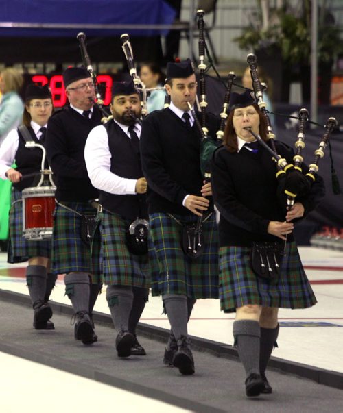 BEAUSEJOUR, MB - Opening ceremonies  at the Sun Gro Centre for The Scotties Tournament of Hearts Wednesday evening. Glenaura Pipes and Drums from Selkirk lead in the curlers. BORIS MINKEVICH / WINNIPEG FREE PRESS January 20, 2016