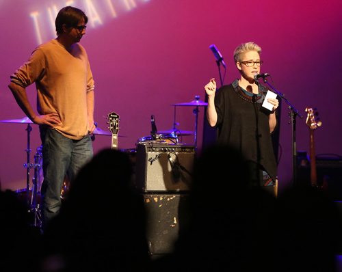 South Osborne Syrian Refugee Initiative co-founders Matthew Lawrence and Paula Hemsworth (right) speak to the crowd during a fundraising concert at the Park Theatre on Jan. 19, 2016. The event raised about $14,500 to bring Syrian families to Winnipeg and help them get settled. The concert at the Park Theatre featured local acts the Bonaduces, Sweet Alibi and DJ Co-op. Photo by Jason Halstead/Winnipeg Free Press RE: Social Page