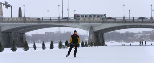 James Torrance was on the Red River Mutual Trail shortly after it officially opened Thursday morning. This part of the trail begins at the skating rink on the Assiniboine River at The Forks and ends at the Norwood Bridge (background in photo). Bill Redekop story. Wayne Glowacki / Winnipeg Free Press Jan. 21 2016
