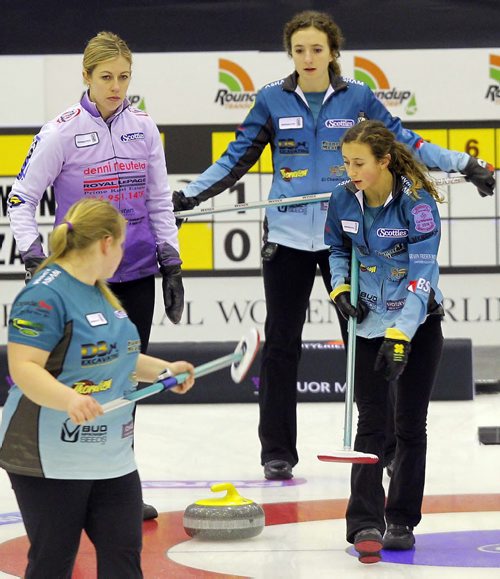 BEAUSEJOUR, MB -Skip Mackenzie Zacharias, right back,  and her 14 year old little sister Emily, right front, at the 4:30 draw at Sun Gro Centre for The Scotties Tournament of Hearts Thursday evening. Left back is Michelle Montford, and left front is Jenessa Rutter. BORIS MINKEVICH / WINNIPEG FREE PRESS January 21, 2016